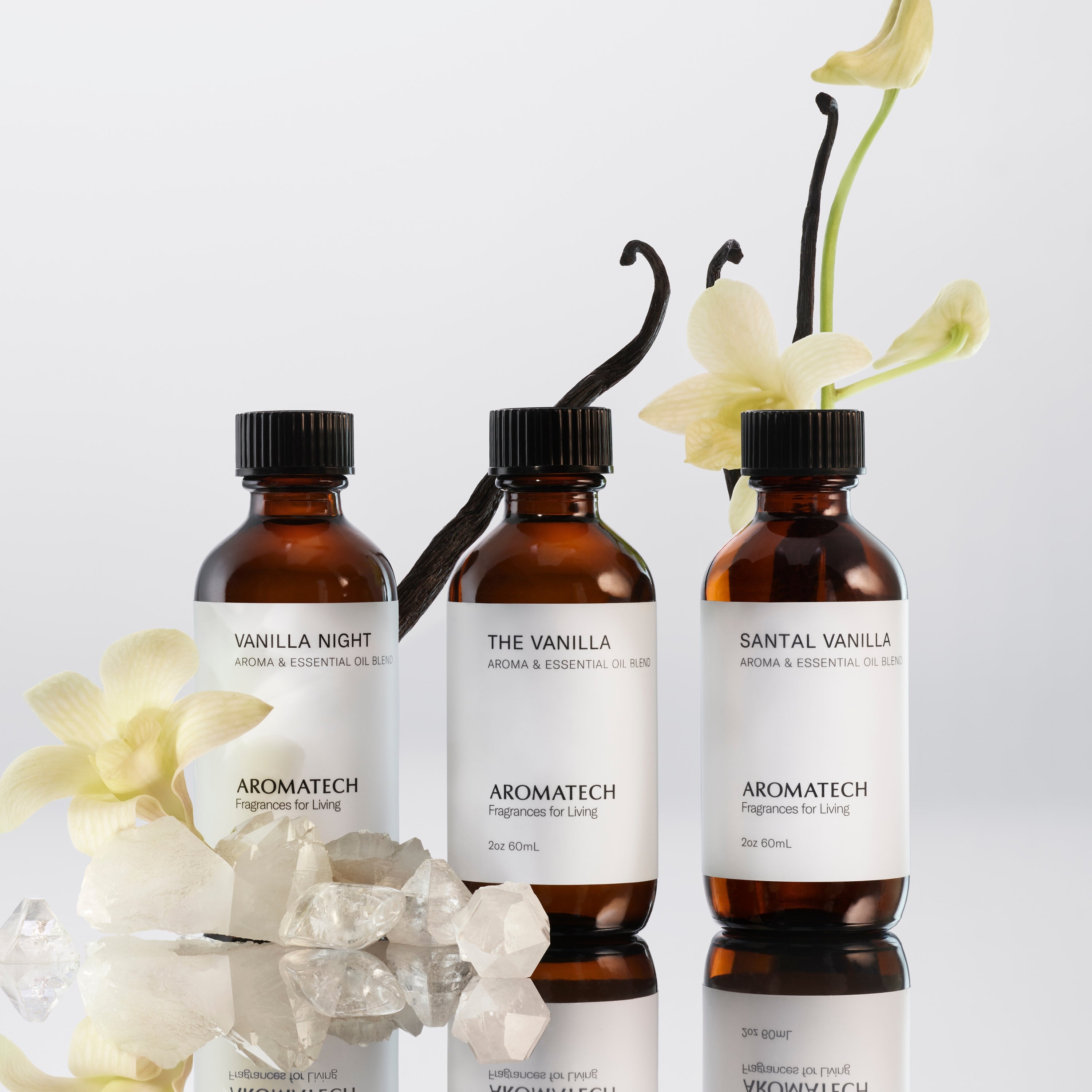 Close-up of Aromatech essential oil bottles labeled 'Santal,' 'Santal Night,' and 'Santal Escape'